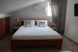 Апартаменты Panorama suites Monte Aria Херцег-Нови Двухуровневые апартаменты с балконом с видом на море-7